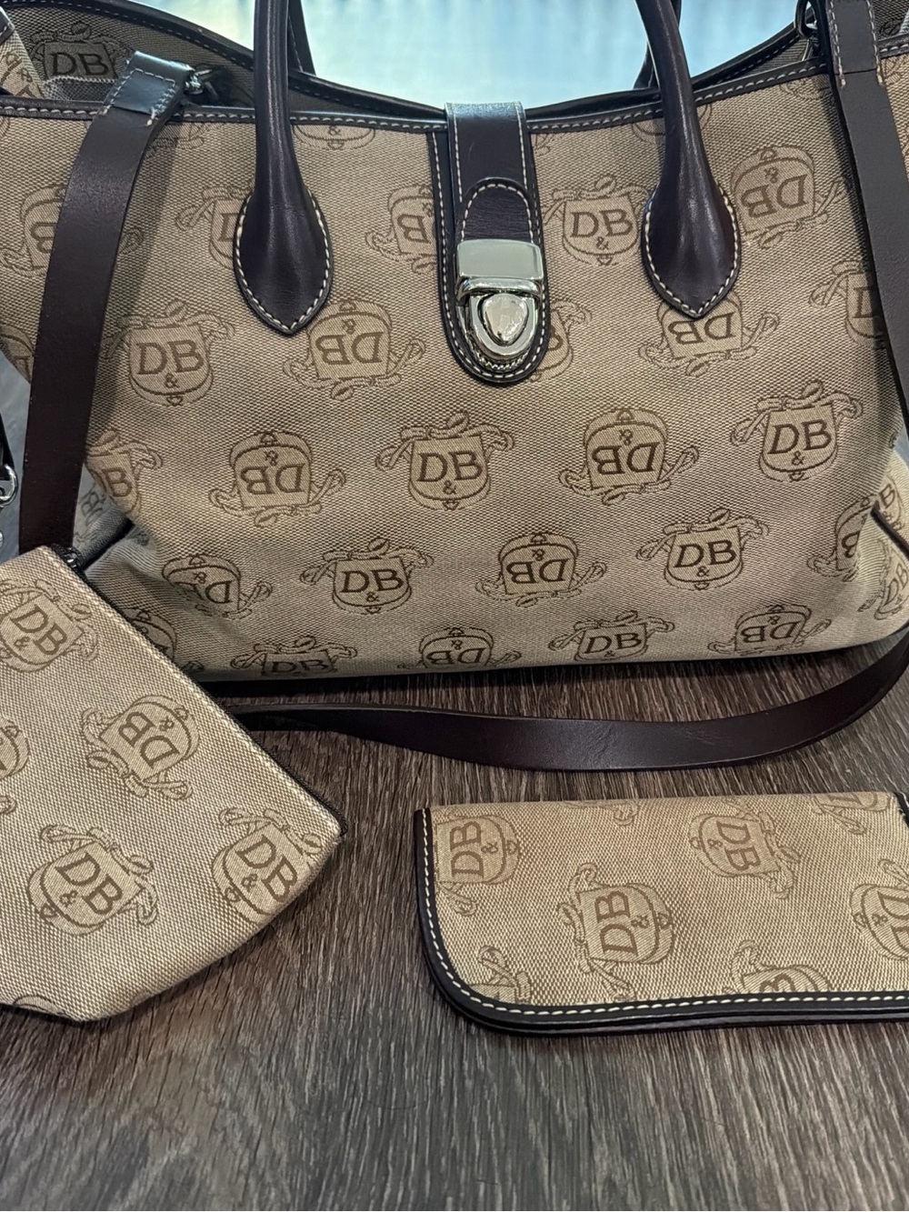 Dooney & Bourke Signature Donegal Crest Canvas tote bag with brown leather trim